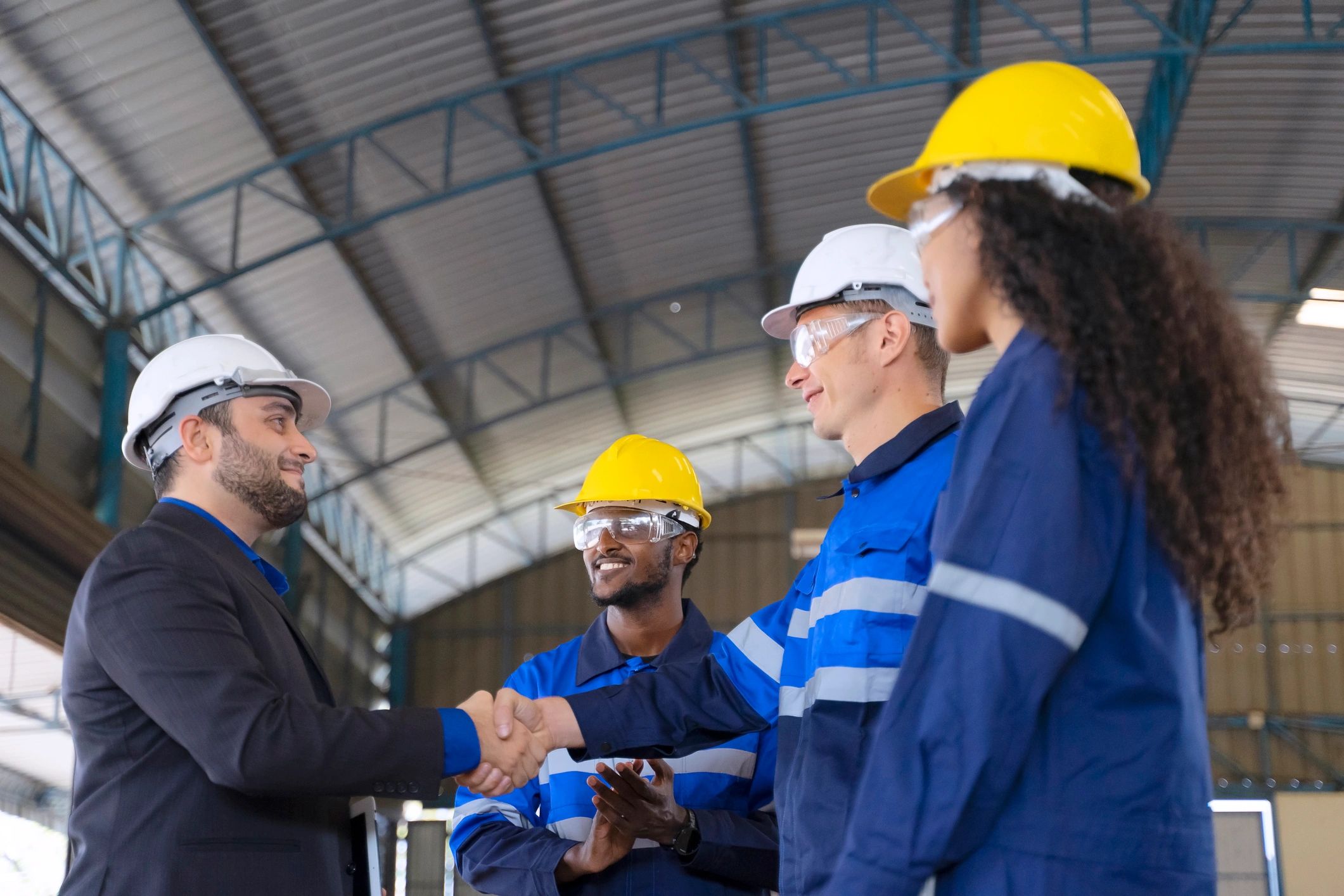Robotics professionals working in a commercial facility